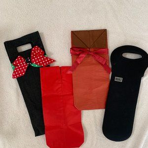 Holiday wine bags (burlap, silk, silk) and neoprene wine tote.  Good condition.